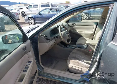 2004 Toyota Camry Le z USA, uszkodzony, nr VIN JTDBE32K540254612